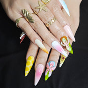Long stiletto press on nails with realistic floral design for party and vacation looks