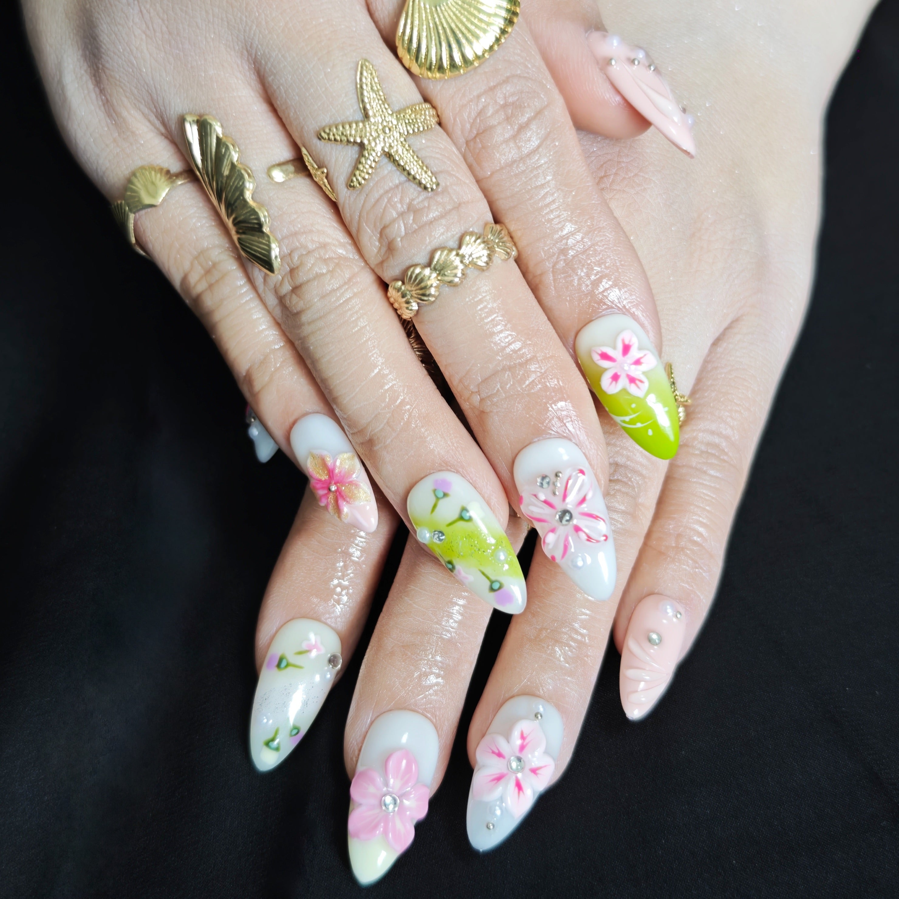 Elegant almond press on nails with soft pink floral design for everyday wear