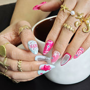 Close up of handcrafted 3D bow details on luxury handmade press on nails