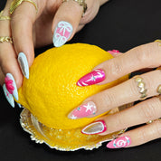 Feminine almond press on nails with 3D bows perfect for dates travel and photos