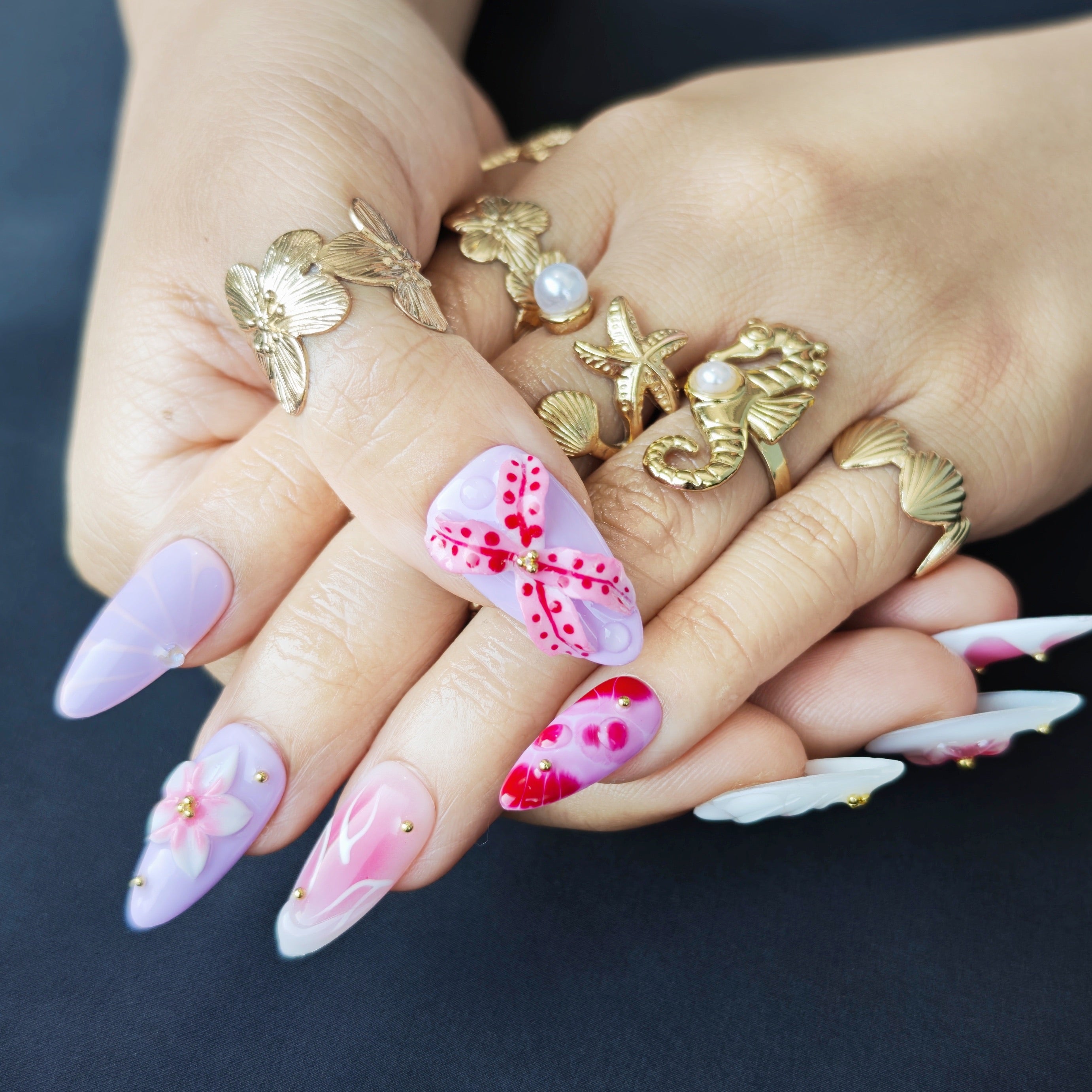 Elegant almond press on nails with 3D floral design for everyday and special occasions