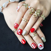 Red and white Christmas-themed short almond press-on nails, practical design for everyday wear, study, and office use