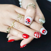 Red and white Christmas-themed short almond press-on nails, practical design for everyday wear, study, and office use