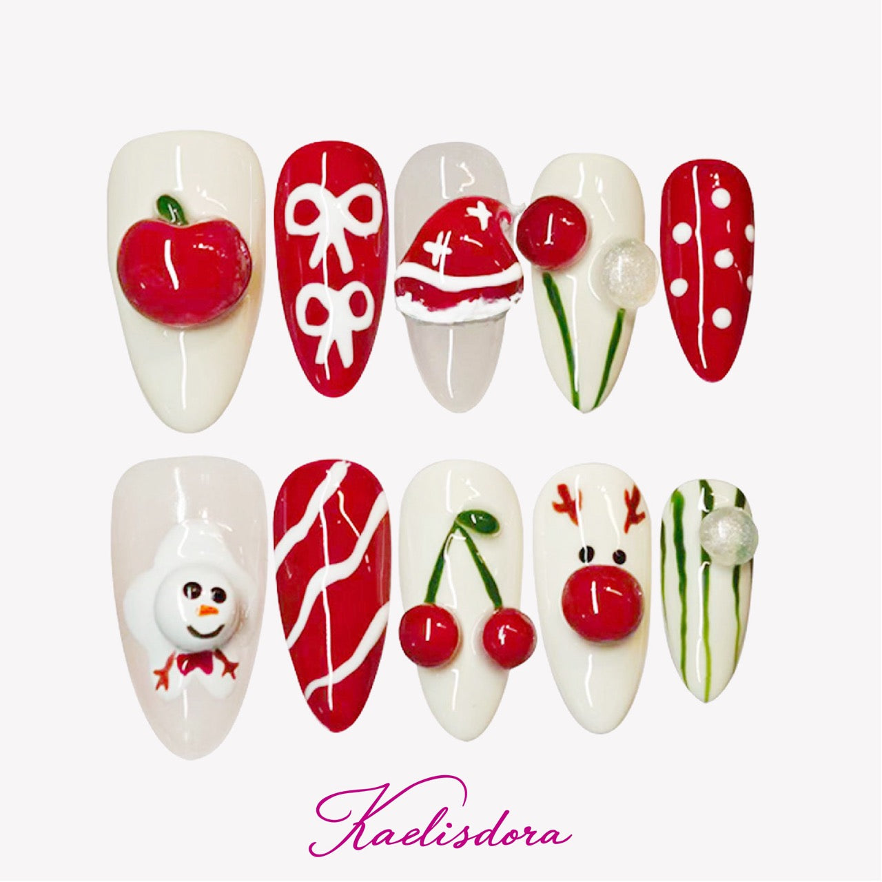 Red and white almond press-on nails with 3D snowman, cherry, Santa hat, bow, and reindeer designs for festive Christmas style.