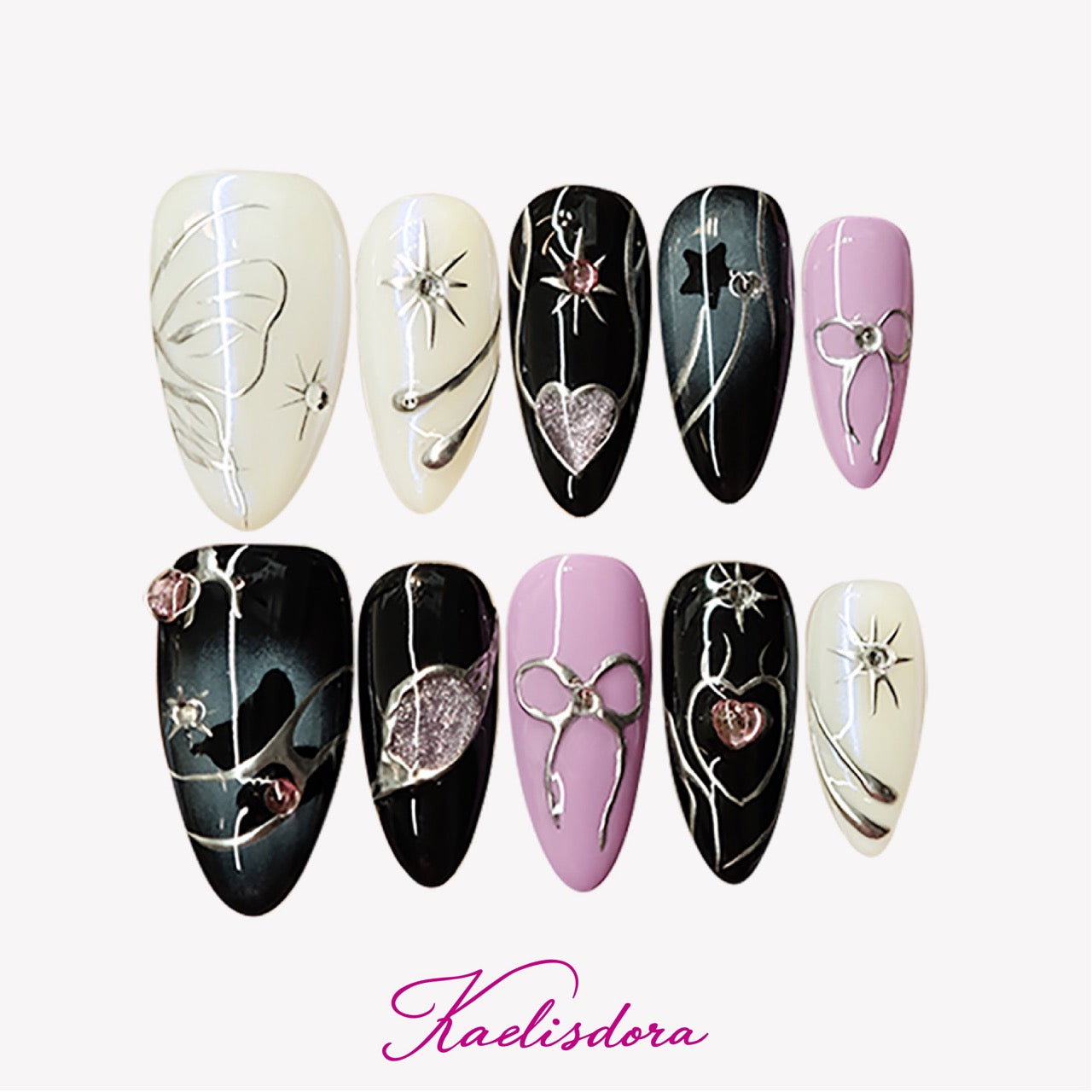 Midnight Rose dark feminine almond press-on nails with matte black vintage roses silver charms and pink accents