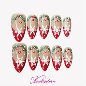 Christmas-themed almond press-on nails with delicate snowflake designs for a festive winter look.