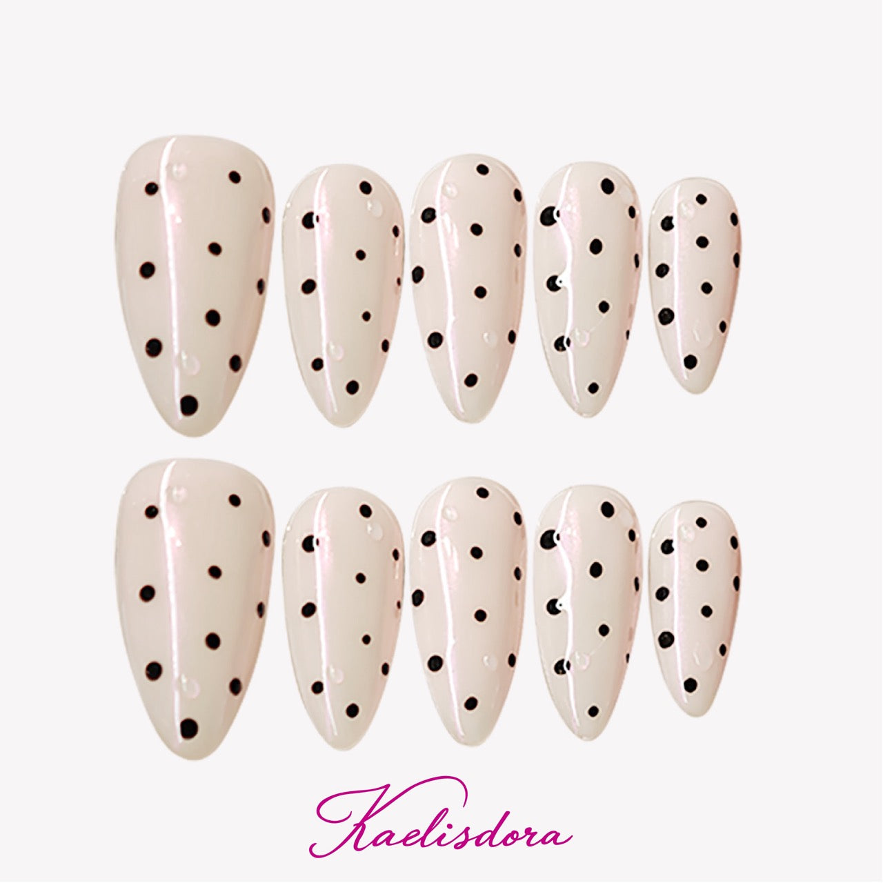 White polka dot almond-shaped press-on nails in minimal MIUMIU-inspired style, trendy for American high school teen girls