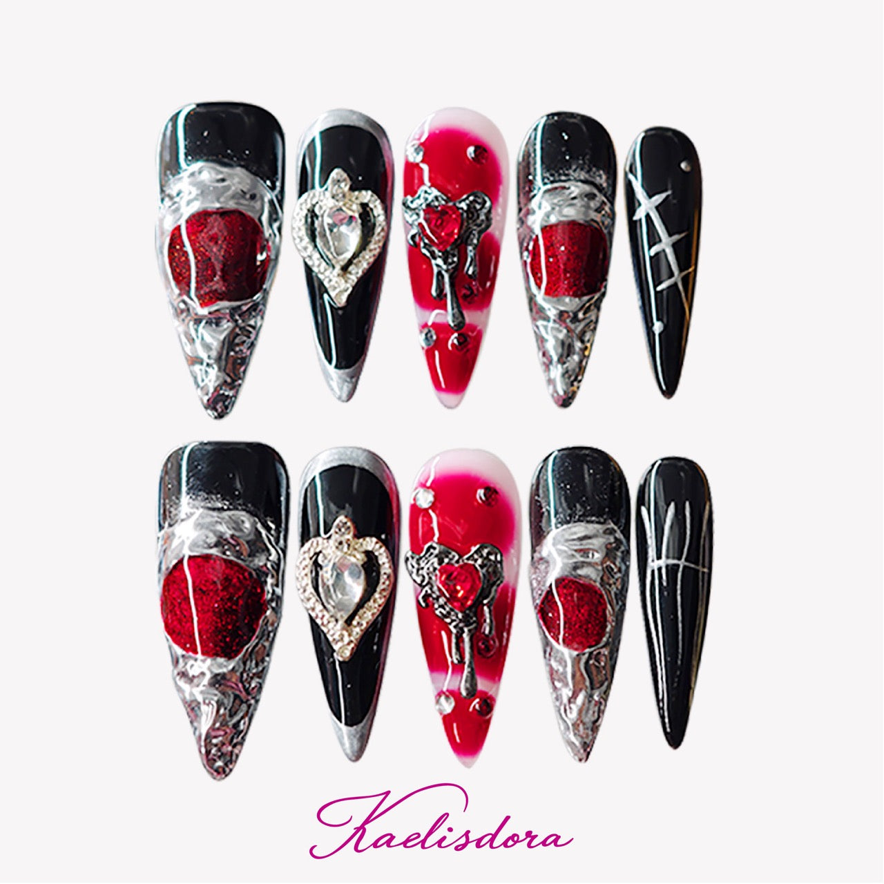 Black and red gothic stiletto press-on nails with silver crystal hearts, perfect for dark and edgy style lovers.
