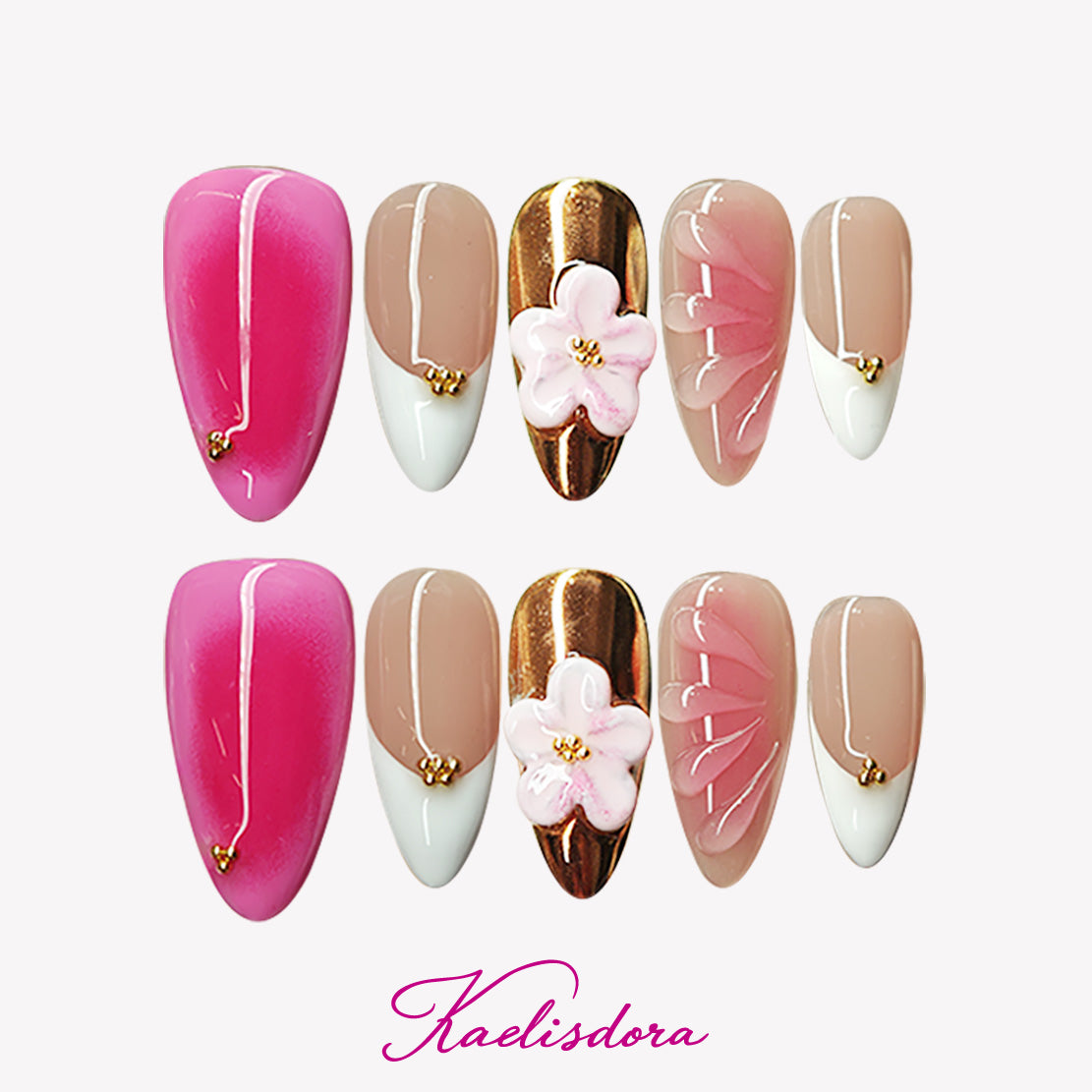 Elegant almond press-on nails in pink and gold with handmade 3D floral designs, French style, and a soft peach summer vibe.
