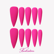 Fuchsia long pointed press-on nails, bold gothic style for party wear, expressing youthful attitude and edgy personality