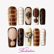 Wild Safari animal texture long square press-on nails with brown tones tortoise shell and snake patterns
