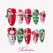 Christmas Magic holiday almond press-on nails with 3D snowman Christmas tree and red green designs